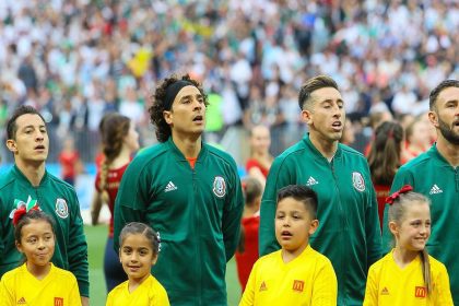 Mexican soccer legend Andres Guardado celebrating a goal during a match, showcasing his passion for the game.