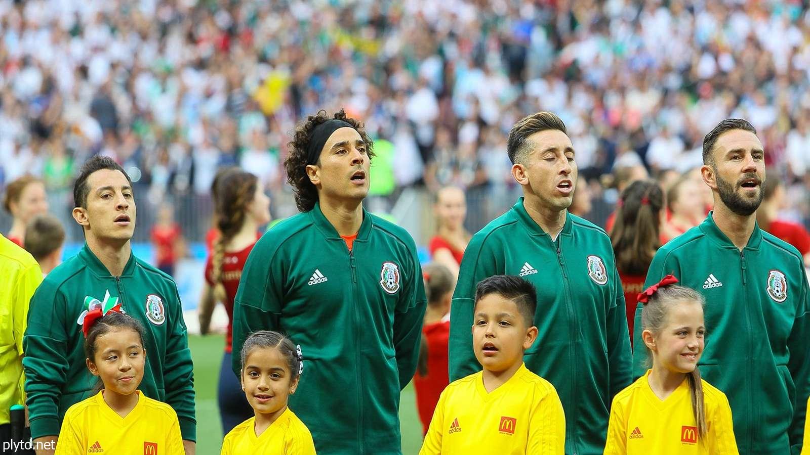 Mexican soccer legend Andres Guardado celebrating a goal during a match, showcasing his passion for the game.