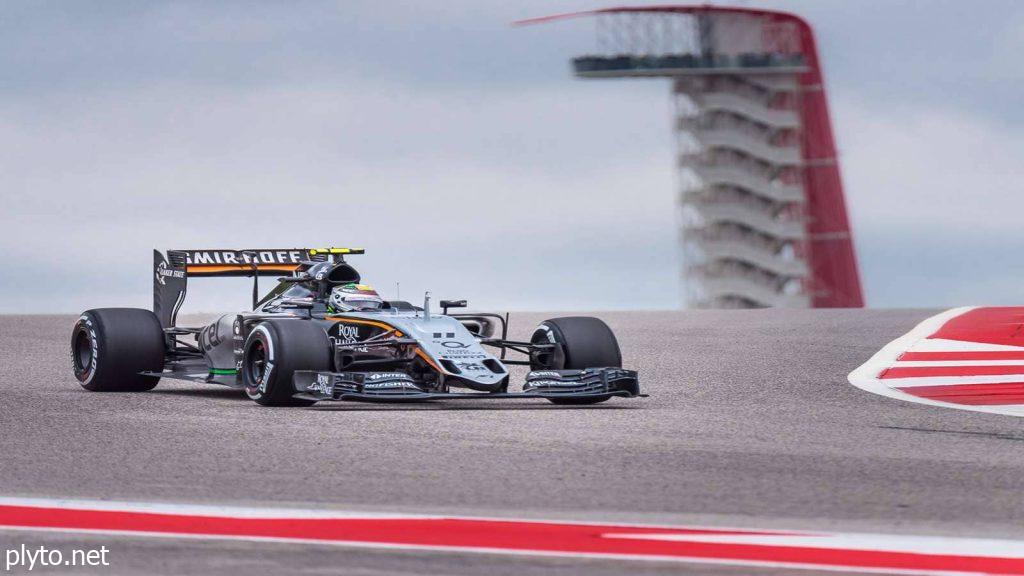 Lewis Hamilton maneuvering through a challenging corner at the Circuit of the Americas during the Formula 1 season.