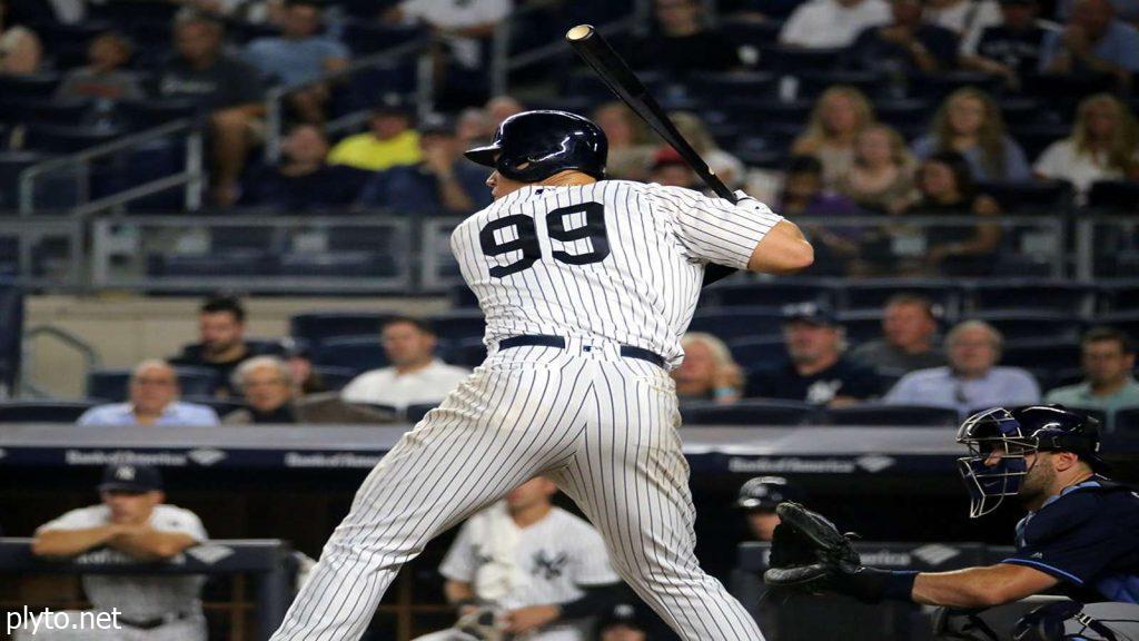 Close-up of Aaron Judge's batting stance, illustrating the concentration and skill of the New York Yankees' star player as he prepares to face a challenging pitcher.