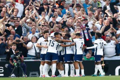 Fans at Wembley cheering during the England vs Ireland Nations League clash, creating a vibrant atmosphere.