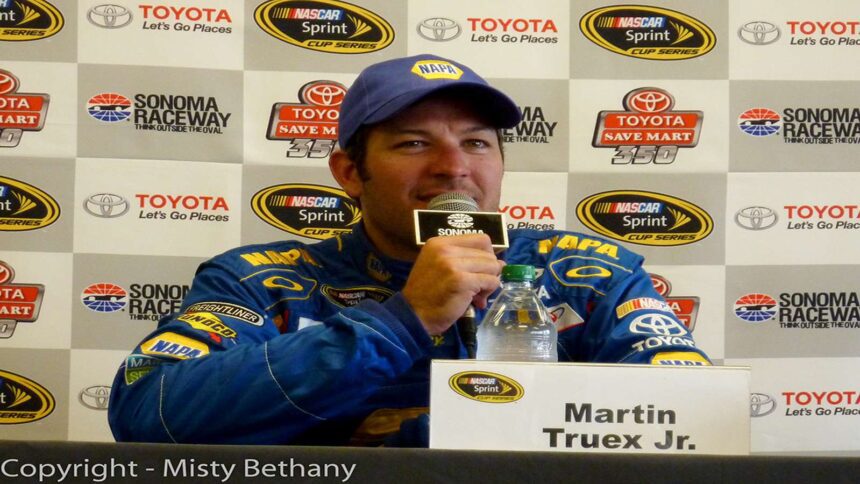 Martin Truex Jr. celebrating his NASCAR Cup Series Championship in 2017.