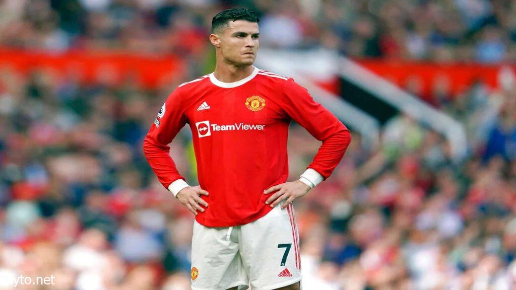 Cristiano Ronaldo preparing for a free-kick in a UEFA Champions League match.