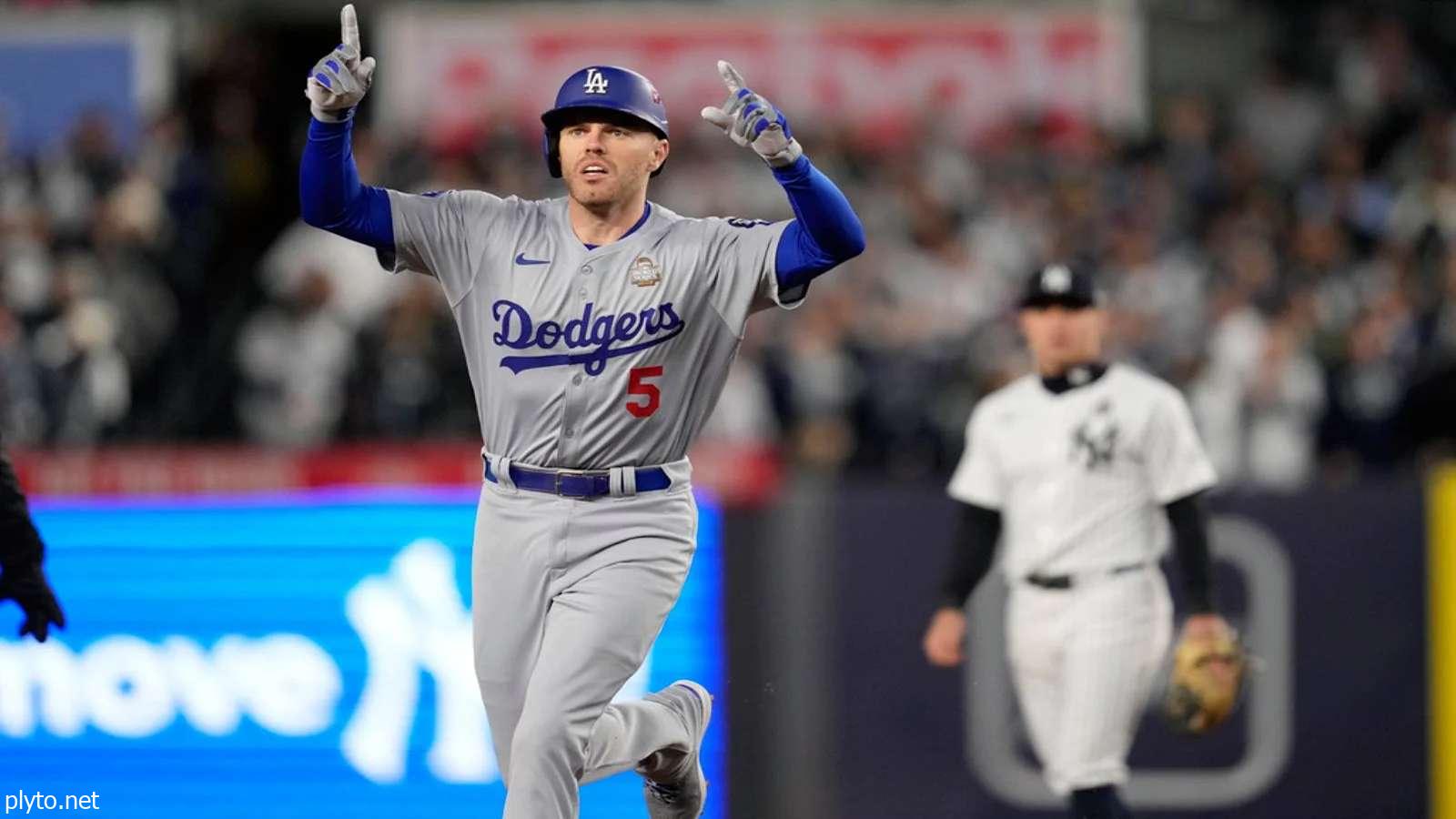 Team Unity: The Dodgers team posing together on the parade float, showcasing their unity and joy after winning the World Series.