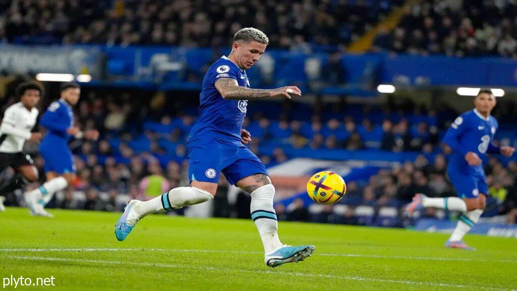 Chelsea fans holding banners in support of Enzo Fernandez at Stamford Bridge.