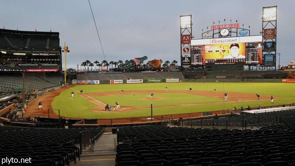 A group of baseball players in a game, symbolizing the competitive landscape of MLB as teams navigate free agency rumors for roster enhancements.